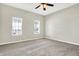 Bedroom featuring carpet, natural light from the windows, and ceiling fan at 523 Terrace Ave, Indianapolis, IN 46203