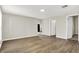 Open-concept living room with wood-look floors and a view into other rooms at 523 Terrace Ave, Indianapolis, IN 46203