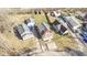 A picturesque aerial shot highlights a residential area featuring a mix of cozy homes and verdant yards at 5334 E Burgess Ave, Indianapolis, IN 46219