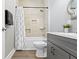Bathroom featuring gray vanity and shower and tub combo at 5334 E Burgess Ave, Indianapolis, IN 46219