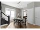 Dining room featuring staircase and views to living room at 5334 E Burgess Ave, Indianapolis, IN 46219