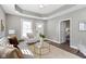 Bright living room features neutral colors, recessed lighting, and hardwood floors at 5334 E Burgess Ave, Indianapolis, IN 46219