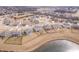 Aerial view of a neighborhood with a pond and cul-de-sac at 5646 Mahogany Dr, Noblesville, IN 46062