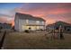 Backyard features a playset and a covered patio with outdoor seating at 5646 Mahogany Dr, Noblesville, IN 46062