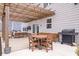 Outdoor patio with pergola, grill, and outdoor furniture, perfect for relaxing and entertaining at 5646 Mahogany Dr, Noblesville, IN 46062