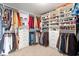 Spacious walk-in closet with custom shelving and ample storage for clothes, shoes, and accessories at 5646 Mahogany Dr, Noblesville, IN 46062