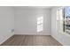 A bright room showcasing wood-look flooring, clean lines, and natural lighting at 7062 Nine Penny Dr, Brownsburg, IN 46112