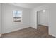 Bright room featuring natural light and a large window overlooking the wintery landscape at 7062 Nine Penny Dr, Brownsburg, IN 46112