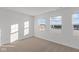 Bedroom with neutral carpet and large windows that let in plenty of natural light at 7062 Nine Penny Dr, Brownsburg, IN 46112