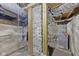 Unfinished basement with exposed ductwork and concrete walls at 714 S Keystone Ave, Indianapolis, IN 46203