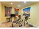 Finished basement featuring home gym with weight bench and colorful decor, perfect for fitness enthusiasts at 7823 Beechwood Farms Dr, Avon, IN 46123