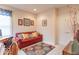 Cozy home office space with a comfortable couch and a view of the outdoors at 7823 Beechwood Farms Dr, Avon, IN 46123
