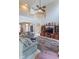 Bright living room with high ceilings, a large entertainment center, and comfortable seating at 7823 Beechwood Farms Dr, Avon, IN 46123