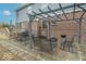 Charming outdoor patio with a pergola and ample seating, perfect for entertaining and relaxation at 7823 Beechwood Farms Dr, Avon, IN 46123