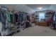 Organized walk-in closet with ample shelving and hanging space, providing efficient storage solutions at 7823 Beechwood Farms Dr, Avon, IN 46123