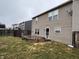 View of the backyard with deck, wooden fence, vinyl siding and grass at 785 Country Gate Dr, New Whiteland, IN 46184