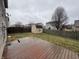 View of backyard, with a wooden deck, wooden fence, shed and grass at 785 Country Gate Dr, New Whiteland, IN 46184