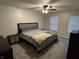 This bedroom features neutral walls and carpet, as well as an expansive window at 785 Country Gate Dr, New Whiteland, IN 46184