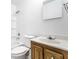 Standard bathroom with tiled shower-tub combination and oak vanity with white countertop at 8004 Minlo Dr, Indianapolis, IN 46227