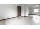 Bedroom featuring tiled floors, closet with sliding mirrored doors, and neutral wall color at 8004 Minlo Dr, Indianapolis, IN 46227