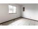 Bedroom features neutral walls and flooring and a window at 8004 Minlo Dr, Indianapolis, IN 46227