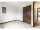 Bedroom featuring neutral walls and flooring and a closet at 8004 Minlo Dr, Indianapolis, IN 46227
