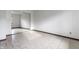 Neutral bedroom offering tiled floor and a built-in mirrored wardrobe with ample space at 8004 Minlo Dr, Indianapolis, IN 46227