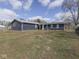 Sprawling backyard with partial fencing and a lush green lawn at 912 Sweetbriar Ave, Whiteland, IN 46184