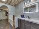 Bathroom with modern illuminated mirror, wall art, and decorative ceiling at 912 Sweetbriar Ave, Whiteland, IN 46184