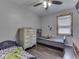 Shared bedroom with two twin beds and hardwood flooring at 912 Sweetbriar Ave, Whiteland, IN 46184