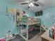 Unique room with lofted bed and light blue walls at 912 Sweetbriar Ave, Whiteland, IN 46184