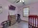 Cozy bedroom featuring a crib, natural light, and hardwood flooring at 912 Sweetbriar Ave, Whiteland, IN 46184