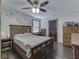 Charming bedroom with decorative wall art, natural light, and hardwood flooring at 912 Sweetbriar Ave, Whiteland, IN 46184