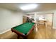 Finished basement with a pool table, offering space for entertainment and relaxation at 9978 Niagara Dr, Fishers, IN 46037