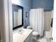 Modern bathroom with neutral walls, a single sink vanity, and a shower-tub combination at 9978 Niagara Dr, Fishers, IN 46037