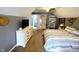 This spacious bedroom with vaulted ceilings includes a double bed, desk area, and television at 9978 Niagara Dr, Fishers, IN 46037