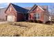 Charming brick home with a well-manicured lawn and beautiful landscaping at 9978 Niagara Dr, Fishers, IN 46037
