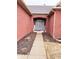 Close-up view of a brick home featuring a stylish arched entrance and double doors at 9978 Niagara Dr, Fishers, IN 46037