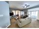 Open-concept living room featuring neutral walls, carpet, and seamless flow to other areas at 9978 Niagara Dr, Fishers, IN 46037