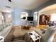 Comfortable living room with plush seating and open layout to the kitchen at 9978 Niagara Dr, Fishers, IN 46037
