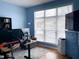 This bright office space has a large window, hardwood floors, and an ergonomic workspace at 9978 Niagara Dr, Fishers, IN 46037