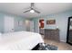 Airy bedroom offering a glimpse into the ensuite bathroom, complete with neutral decor at 10154 Holly Berry Cir, Fishers, IN 46038