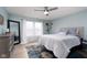 Bright bedroom featuring a comfortable bed, natural light, and attractive decor at 10154 Holly Berry Cir, Fishers, IN 46038