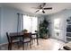 Dining area with a modern table set, bright light, and tile flooring at 10154 Holly Berry Cir, Fishers, IN 46038