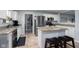 Modern kitchen with granite countertops, stainless steel appliances, and ample cabinet space at 10154 Holly Berry Cir, Fishers, IN 46038
