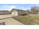 Spacious detached garage with a double door and large yard area at 103 S Delawanda Ave, Muncie, IN 47303