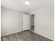 Neutral bedroom features sleek wood-look floors and a bright and open feel at 103 S Delawanda Ave, Muncie, IN 47303