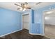 Bedroom with a closet and ceiling fan for additional comfort. Good closet space for storage at 103 S Delawanda Ave, Muncie, IN 47303