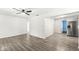 Spacious living room showcasing sleek flooring and seamless open layout at 103 S Delawanda Ave, Muncie, IN 47303