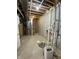 Utility basement area with exposed ductwork, water pipes, and various mechanical systems visible at 10483 St Anne Dr, Zionsville, IN 46077